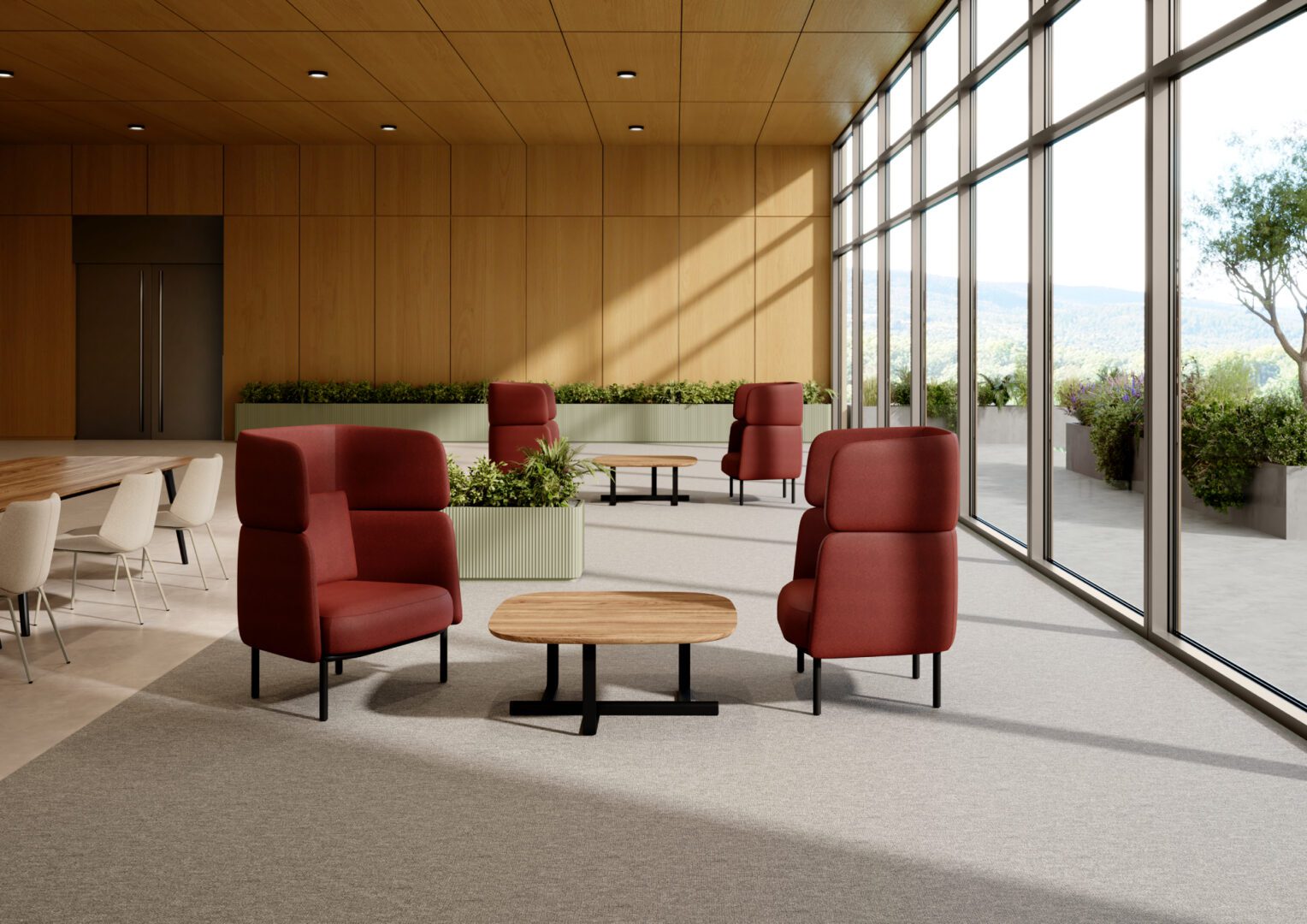 Sunlit modern lounge with red armchairs